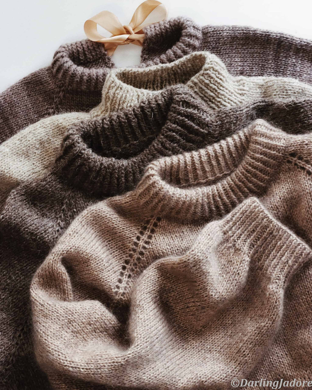 Top-down raglan sweater in cream yarn showing seamless construction - easy pullover knitting pattern by Darling Jadore