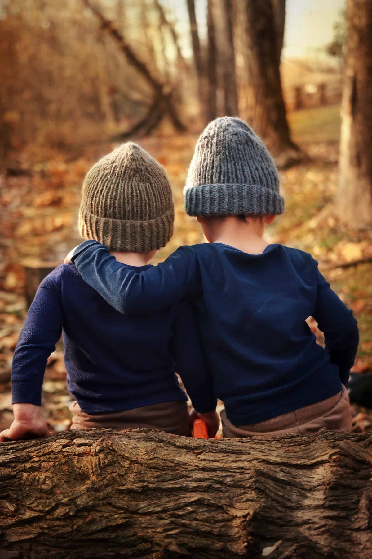 Easy baby beanie knitting pattern with cozy fold-up brim in natural yarn