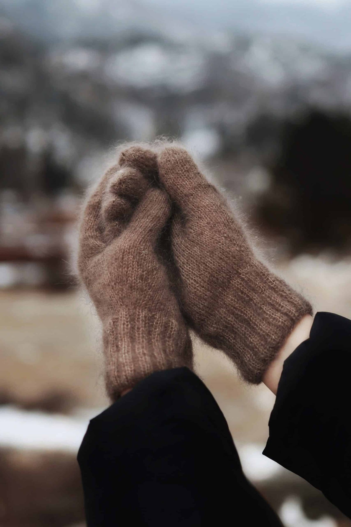 Close up of soft mohair Cloud Gloves knitting pattern in cream showing delicate fuzzy halo texture