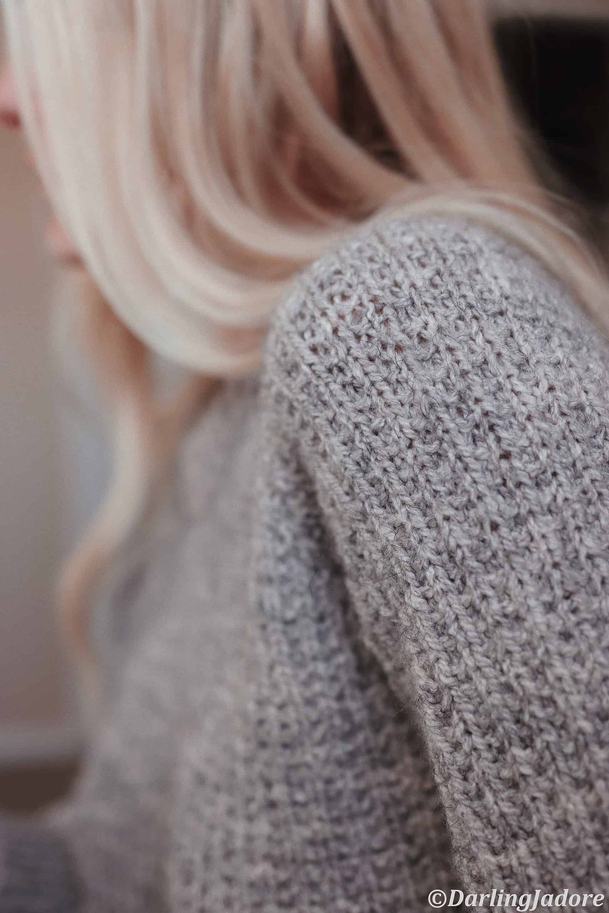 Chunky knit sweater in cream yarn showing textured stitch detail - Hawthorn Sweater knitting pattern by Darling Jadore