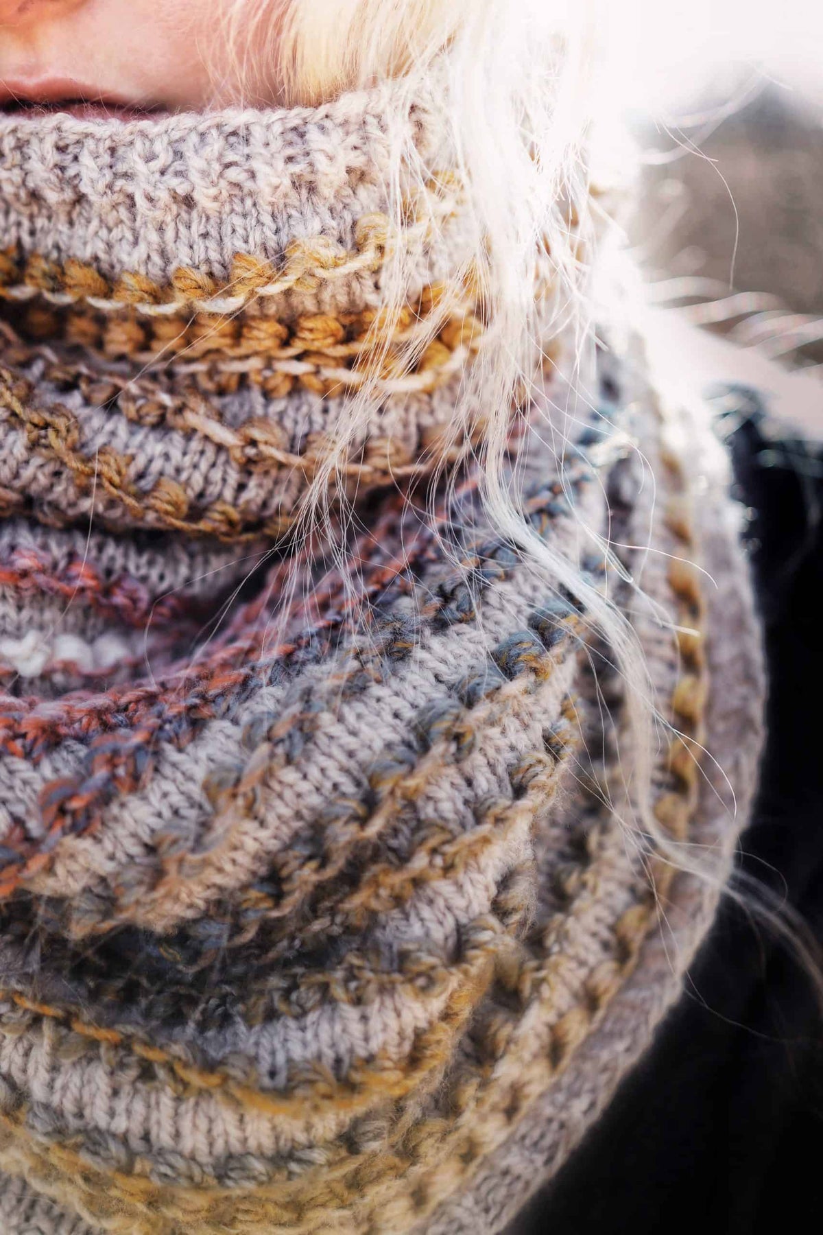 Cream knitted cowl with textured stitch pattern draped elegantly - Rosewood Cowl knitting pattern by Darling Jadore