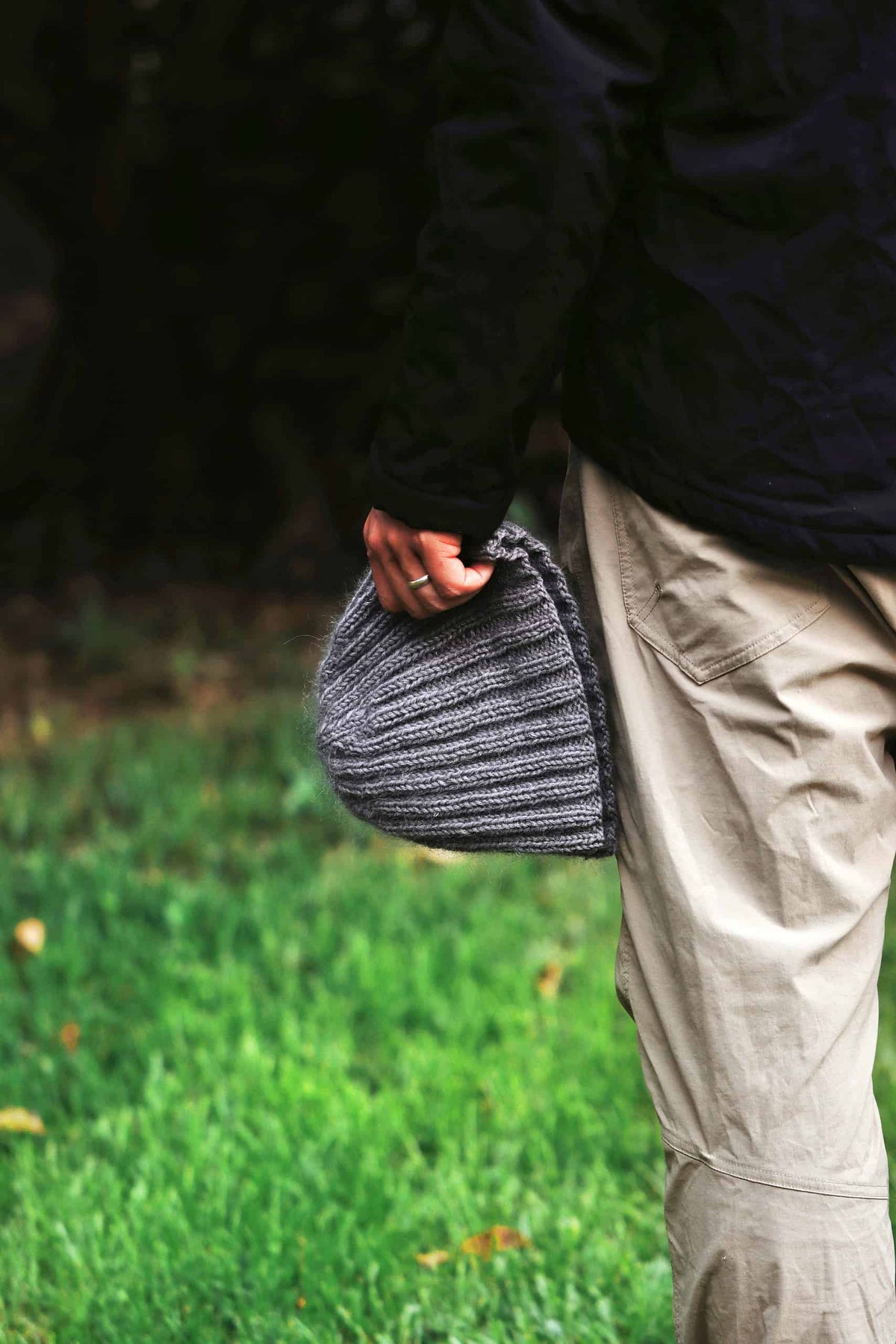 Men's rib beanie knitting pattern detail showing allover ribbing texture