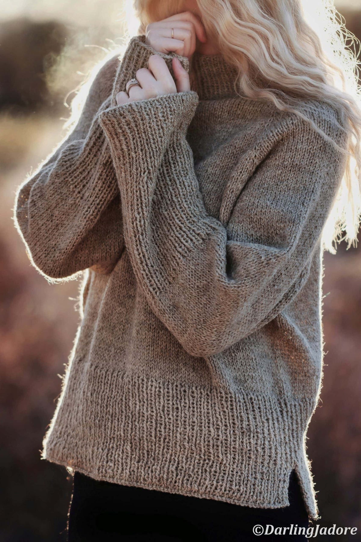Chunky mock turtleneck sweater knitting pattern in cream yarn with raglan sleeves