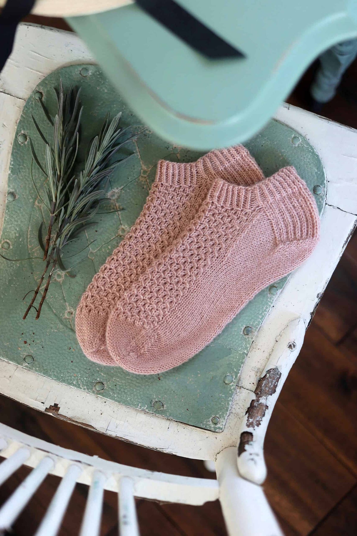 Pink knitted shortie socks with lace detail and sturdy heel construction