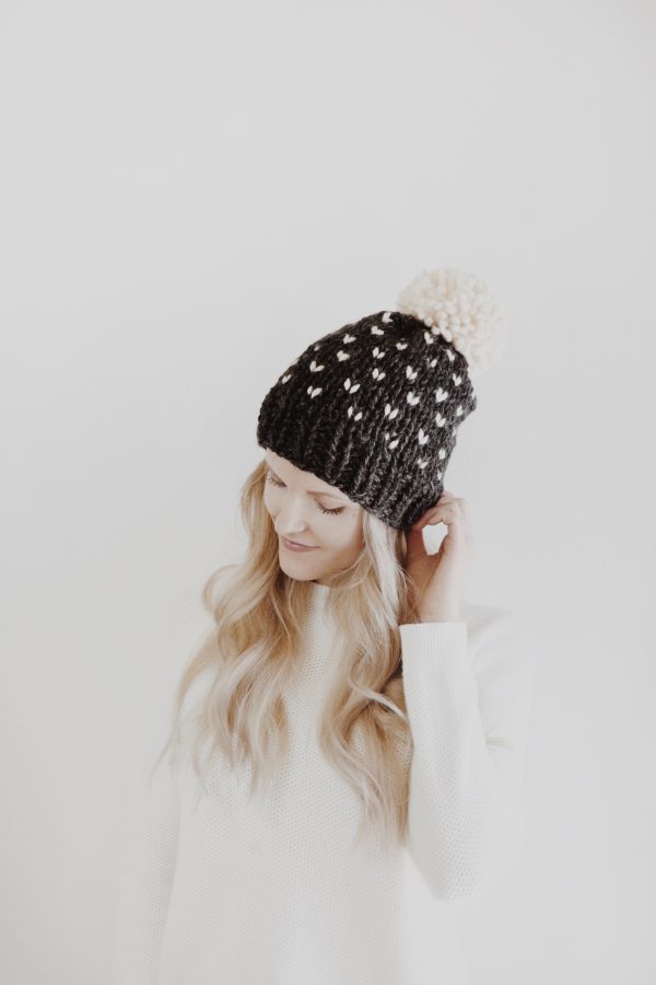 Close up of fair isle colorwork detail on chunky knit beanie with contrasting colors