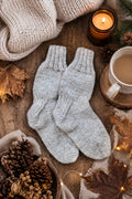 Beginner boot socks knitting pattern with classic ribbing and worsted weight yarn by Darling Jadore