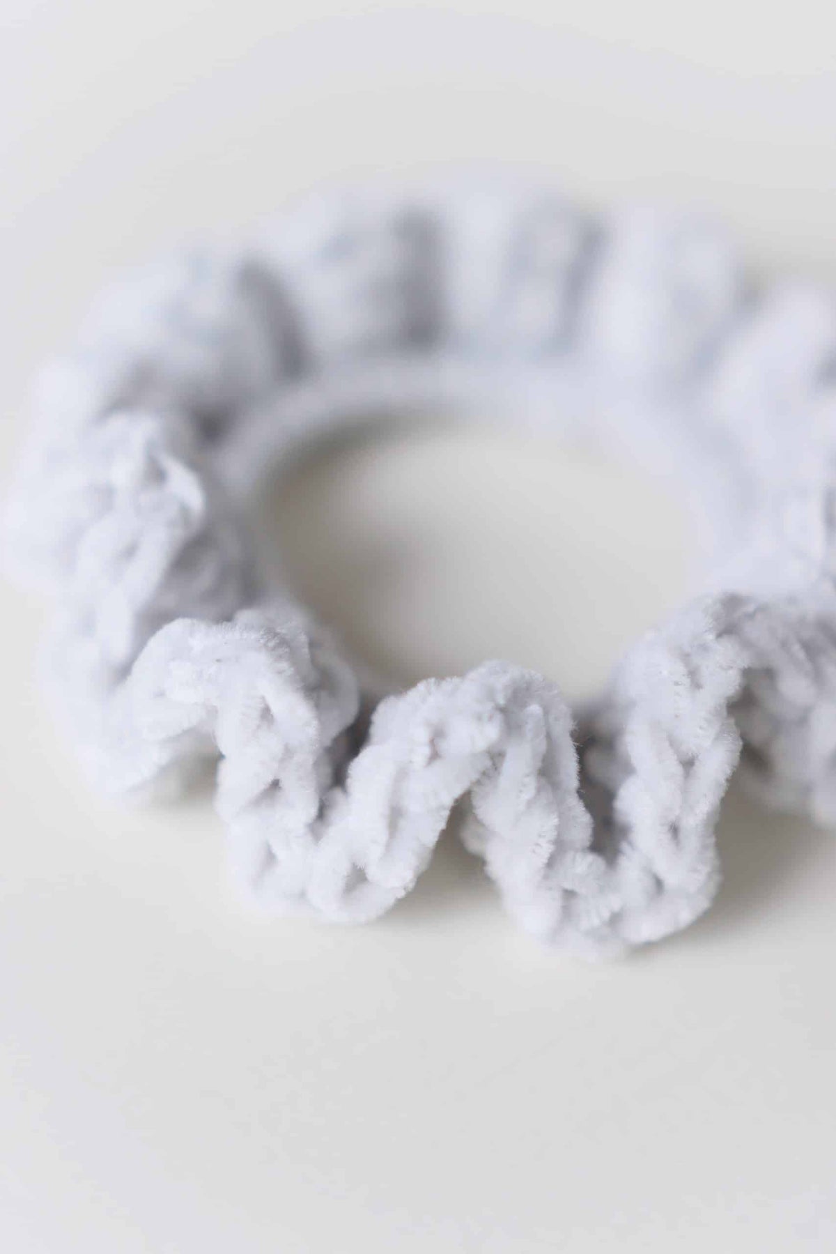 Luxurious velvet scrunchie crochet pattern detail showing perfect ruffles
