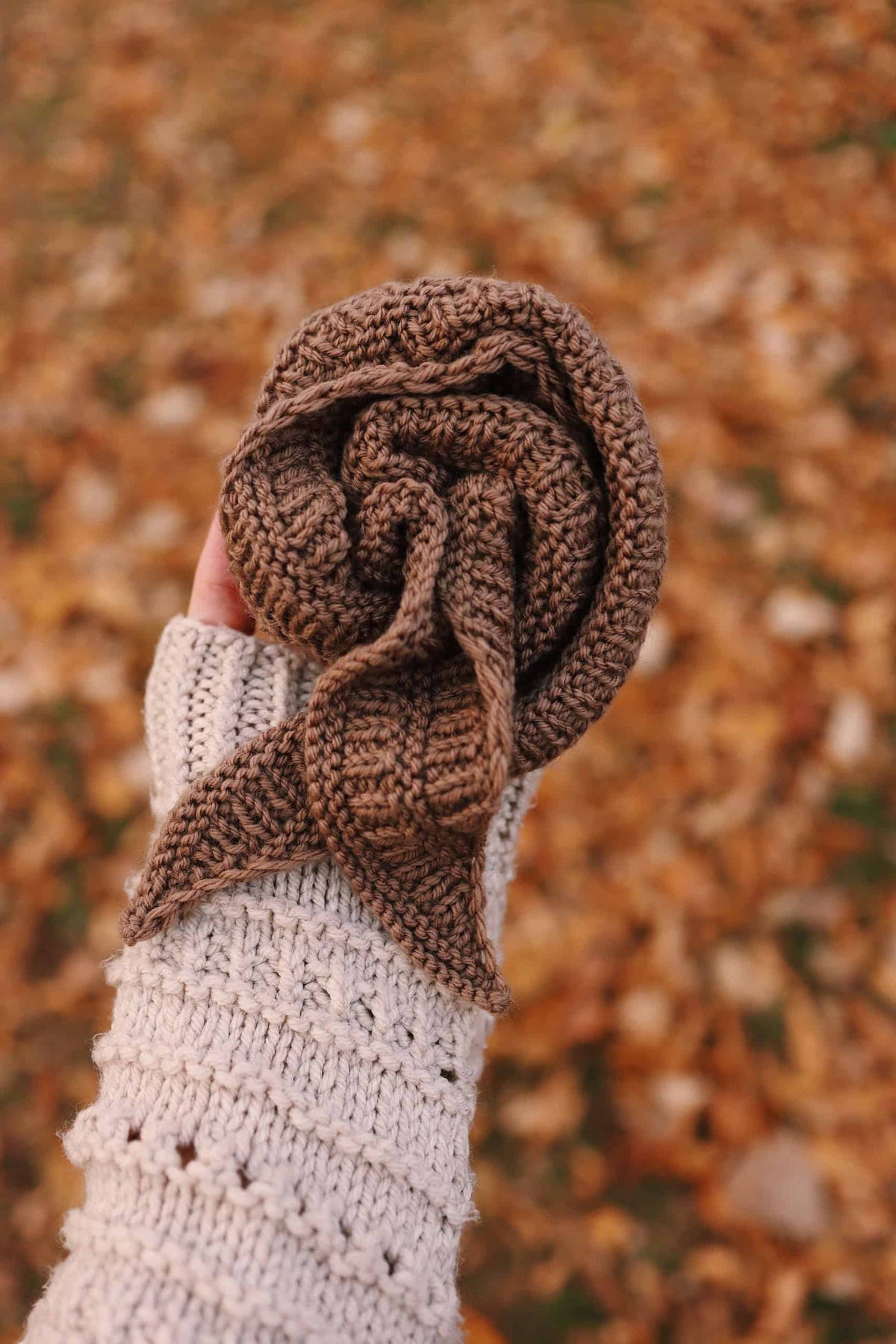 Close up of textured mini scarf knitting pattern detail