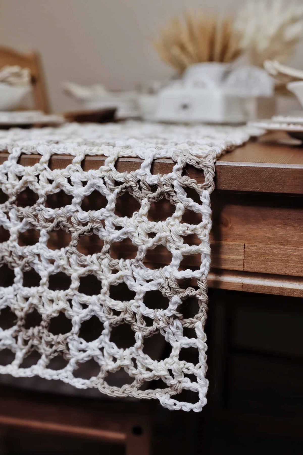 Beginner-friendly lace table runner crochet pattern styled on rustic dining table