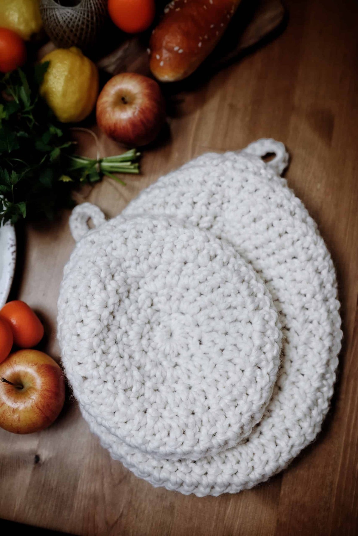 Close-up of oval crochet hanging basket pattern showing texture and opening detail