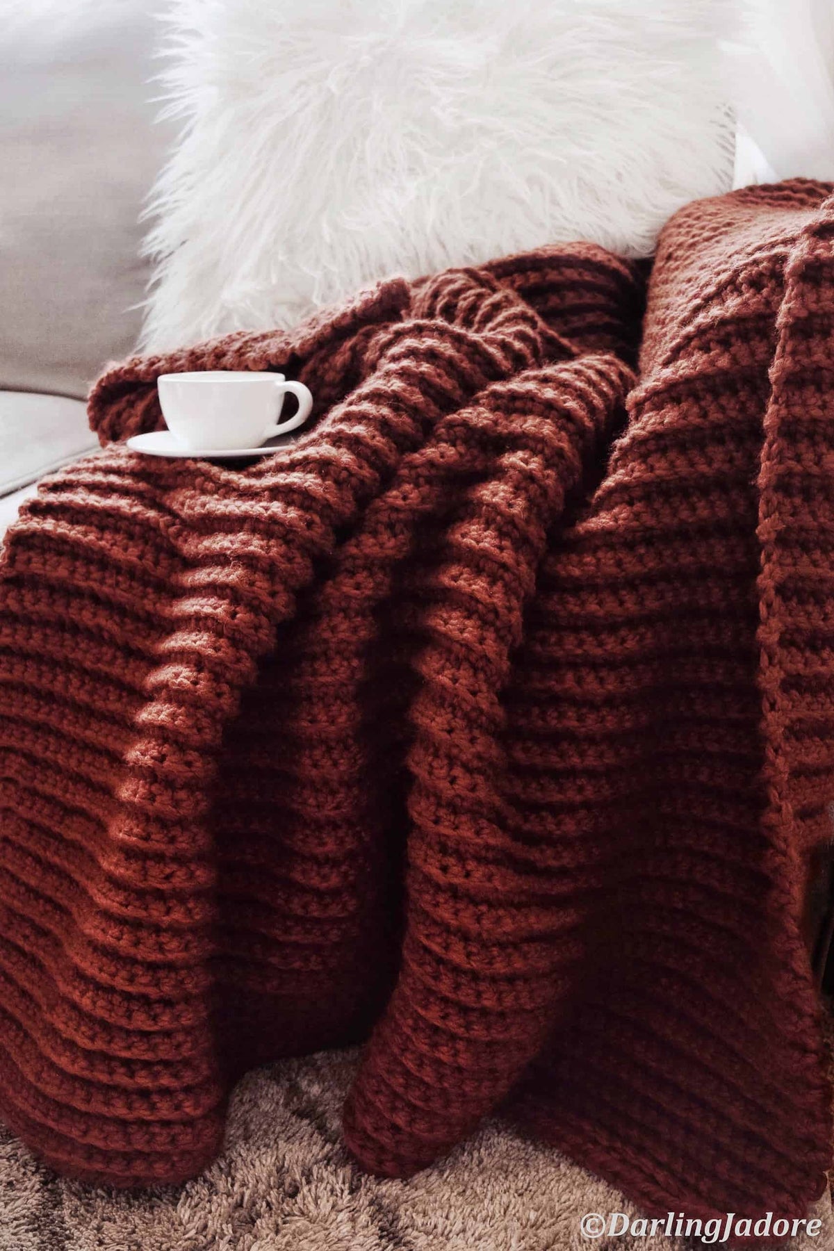 Easy crochet throw pattern in chunky yarn perfect for beginner crocheters
