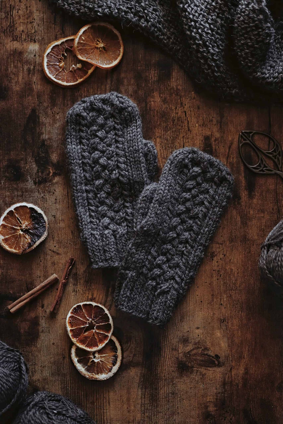 Cable knit mittens pattern worn showing warmth and elegant woven cable design