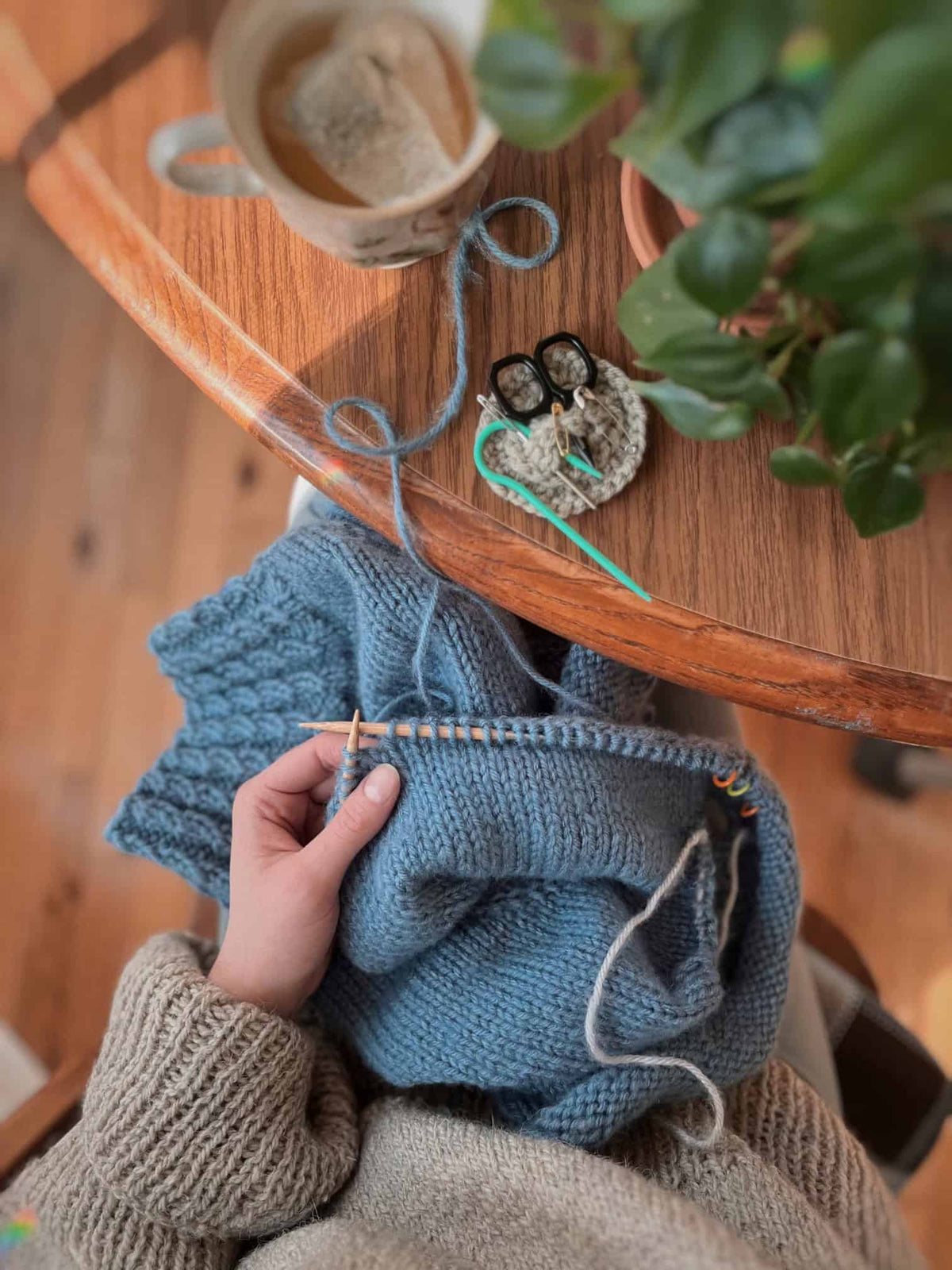 Mistfall Sweater knitting pattern flat lay showing elegant pullover construction