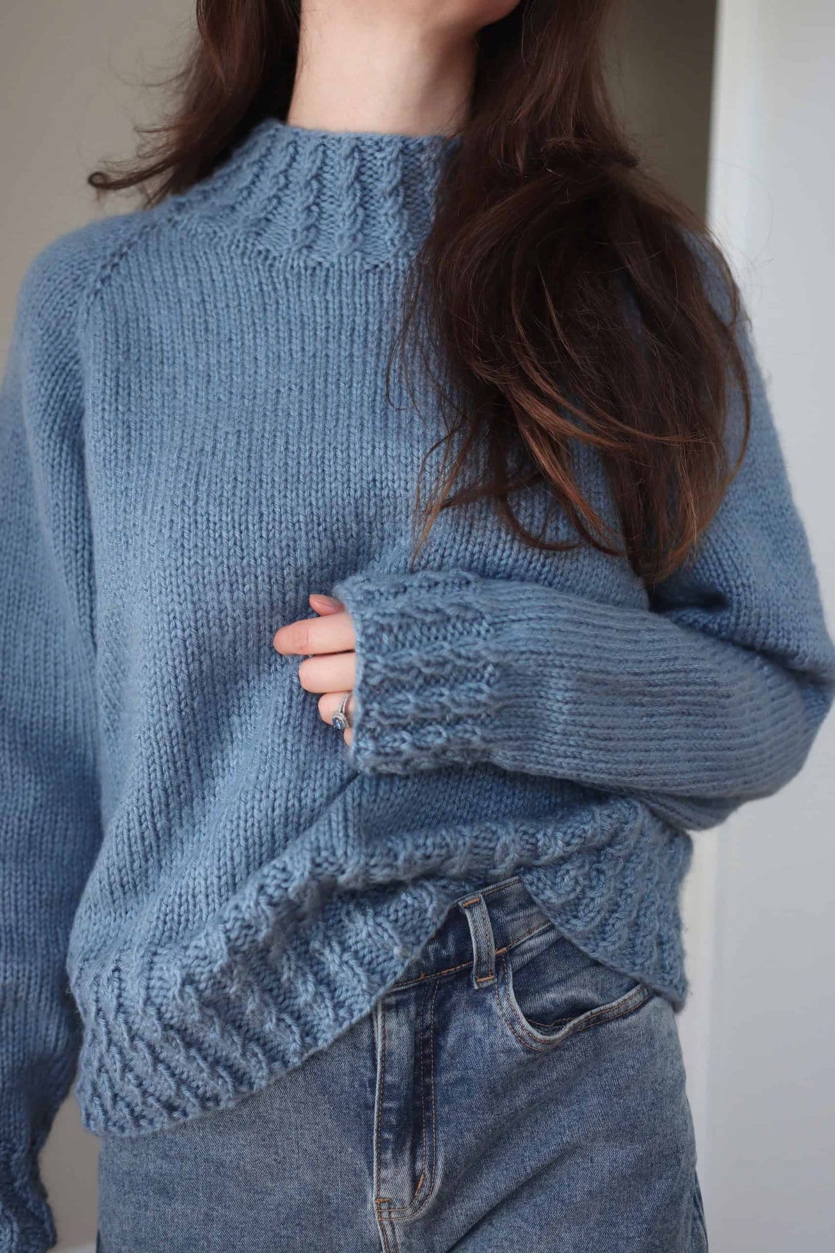 Cream worsted weight raglan sweater with ribbed collar and cuffs - Mistfall Sweater knitting pattern by Darling Jadore