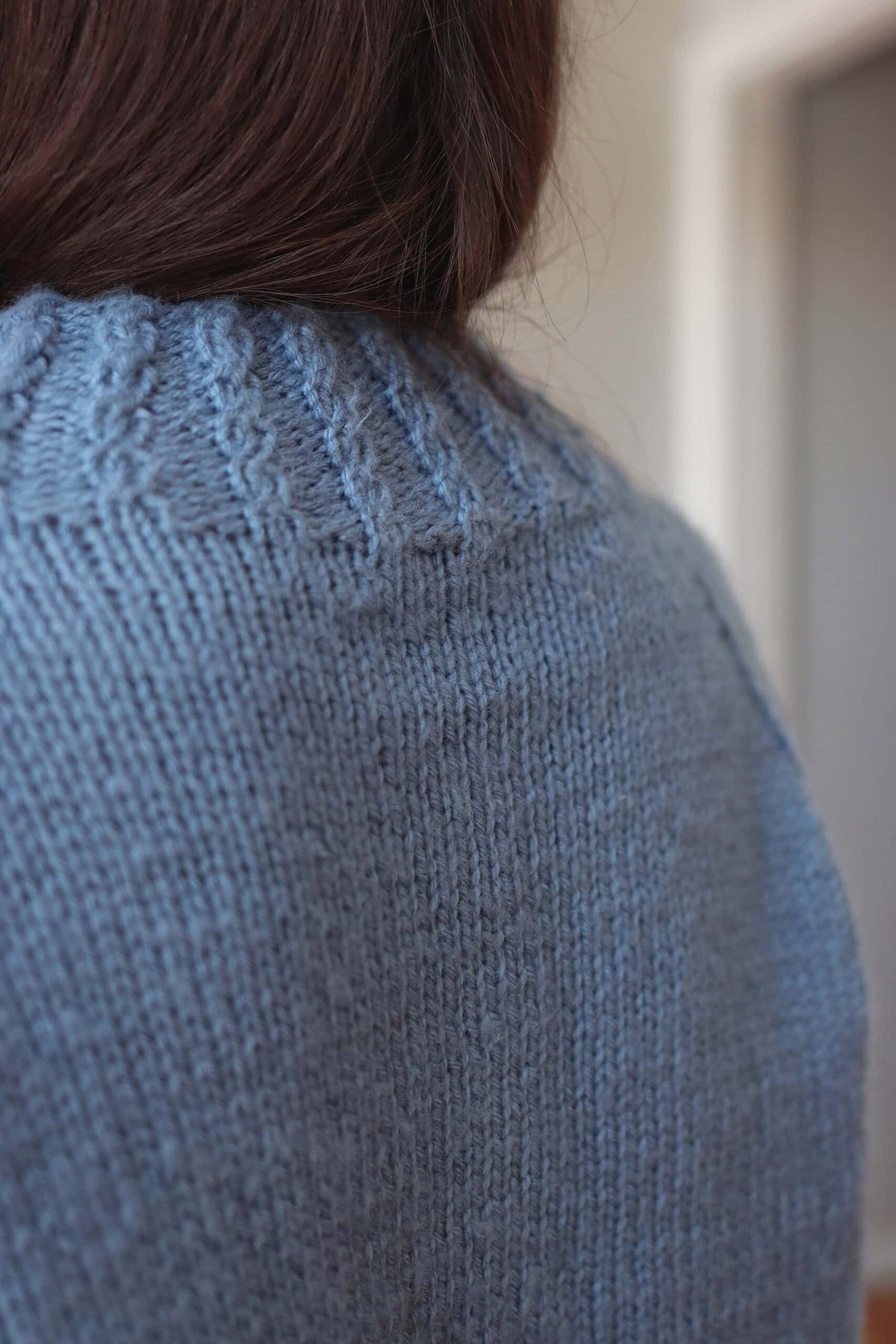 Cream worsted weight raglan sweater with ribbed collar and cuffs - Mistfall Sweater knitting pattern by Darling Jadore