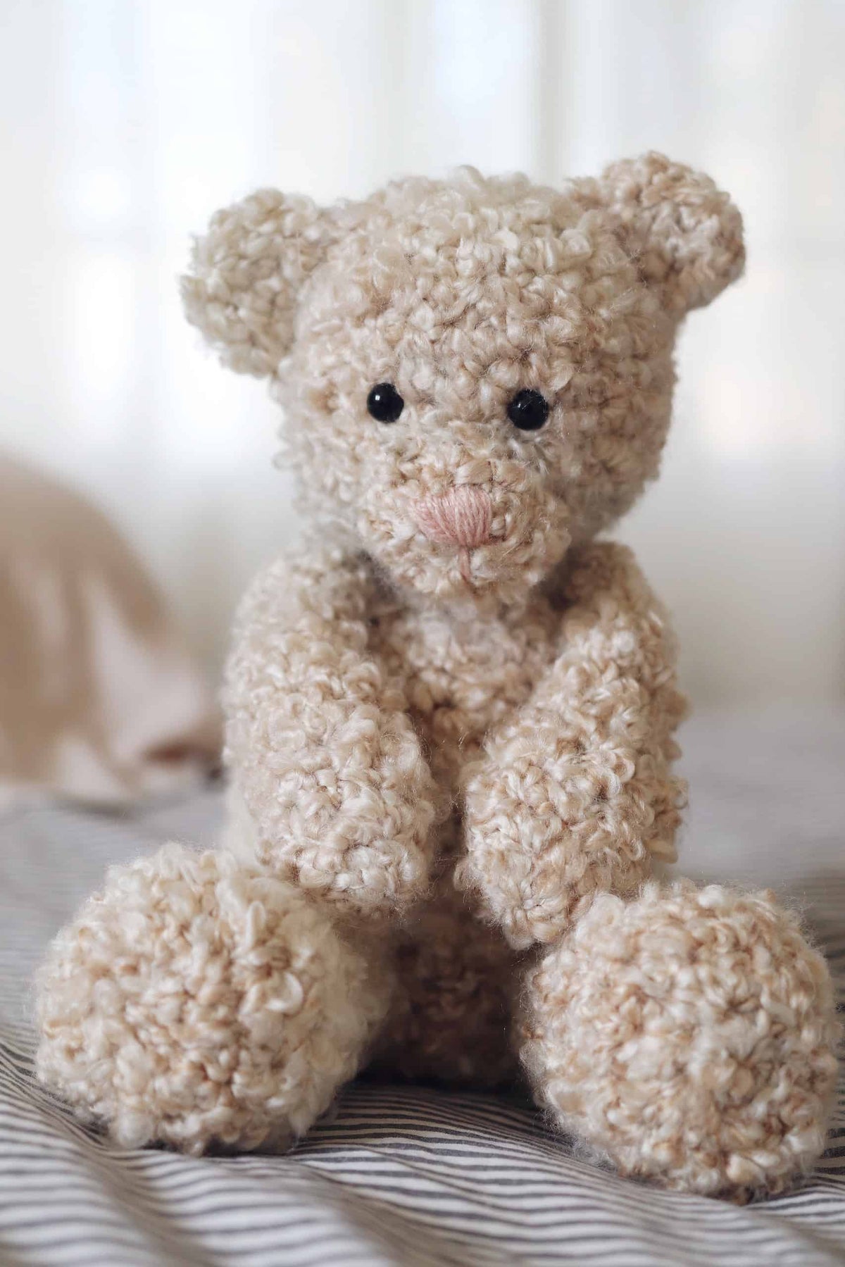 Beginner-friendly crochet bear pattern with timeless design and sweet embroidered face