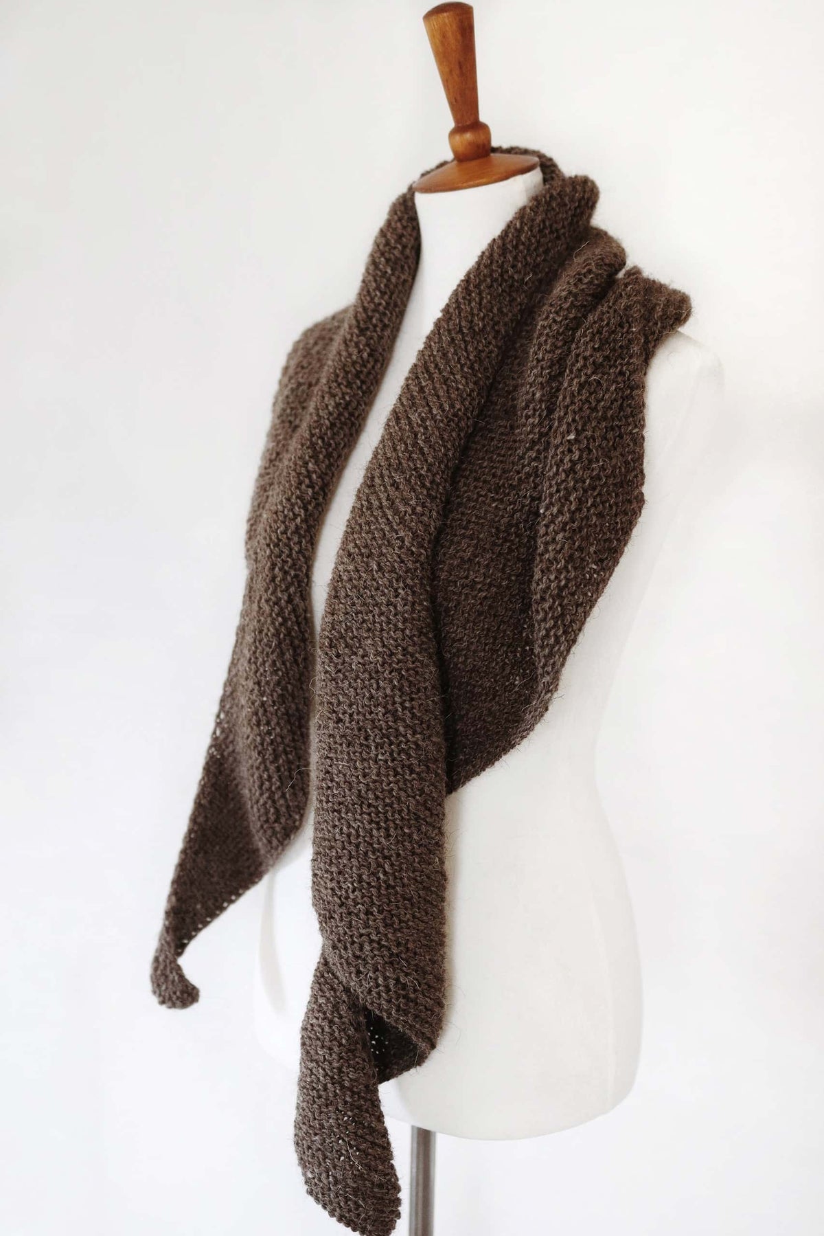 Canyon Scarf knitting pattern styled as asymmetrical shawl with timeless elegance