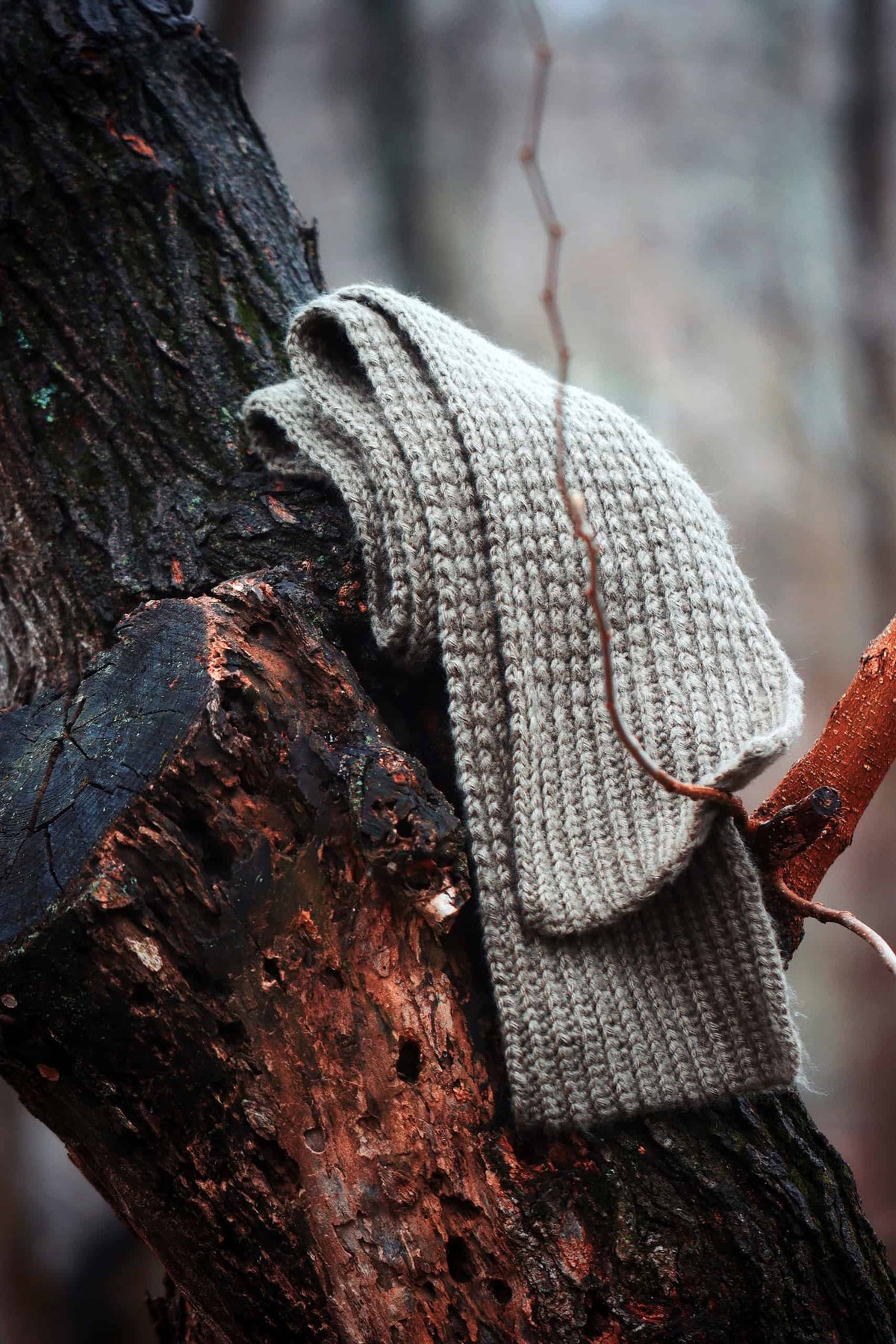 Woman wearing The Haven ribbed crochet scarf in neutral tones for timeless style