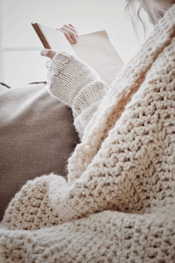 Close up of Oakridge fingerless mittens knitting pattern showing thumb opening and textured stitches