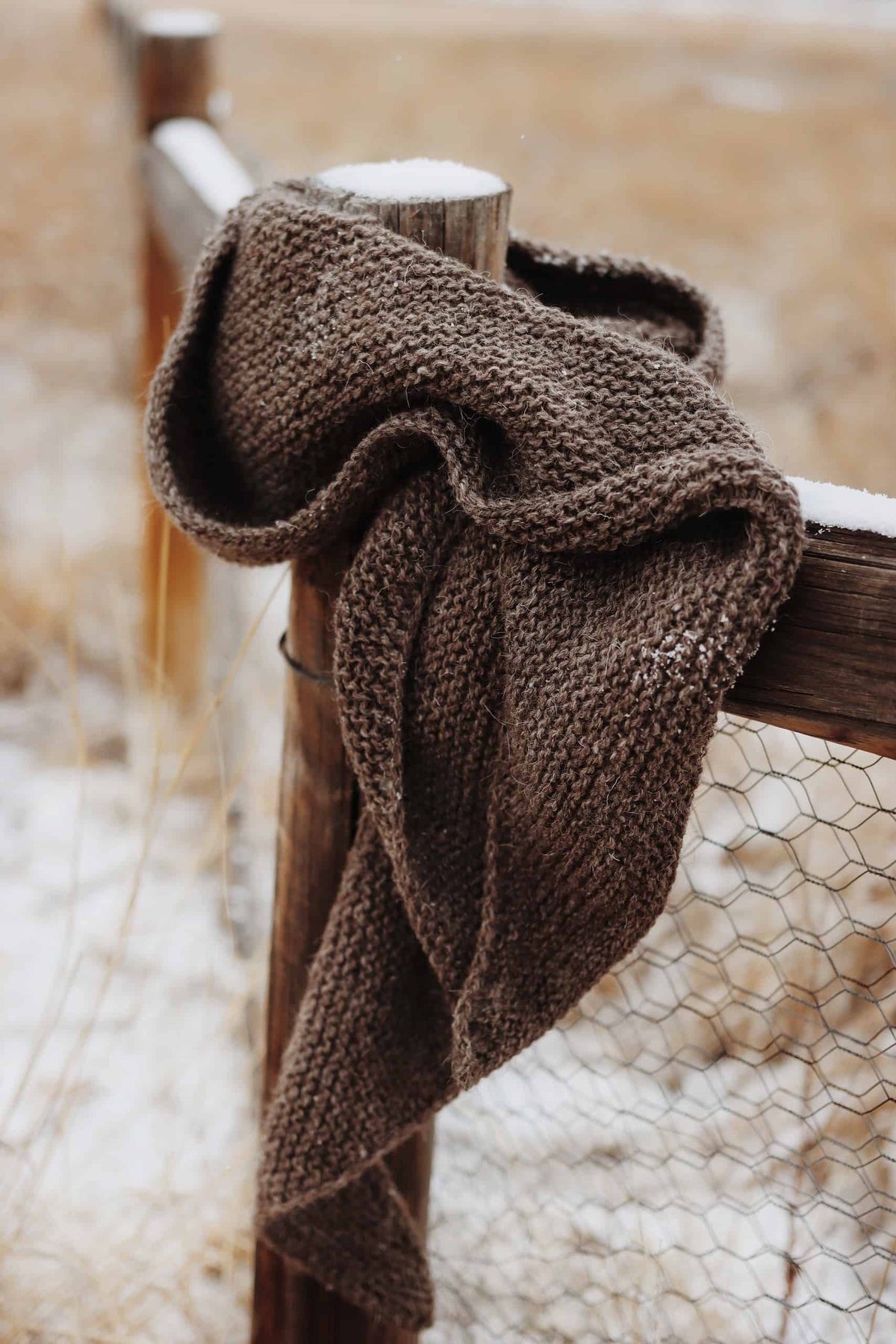 Woman wearing Canyon boomerang scarf showing versatile draping and cozy warmth