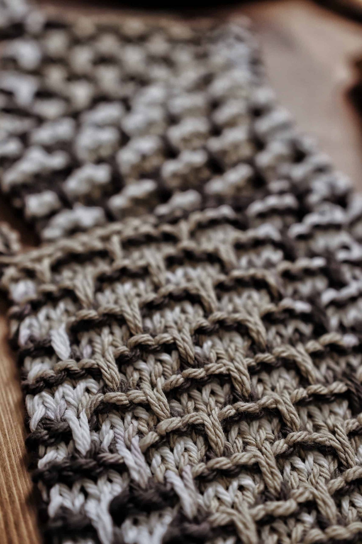 Handmade knit coasters in farmhouse style decor setting with rustic charm