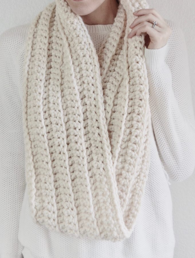 The Reveur infinity scarf crochet pattern styled for fall layering