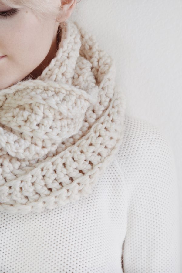 Side view of cozy chunky crochet infinity scarf pattern worn draped