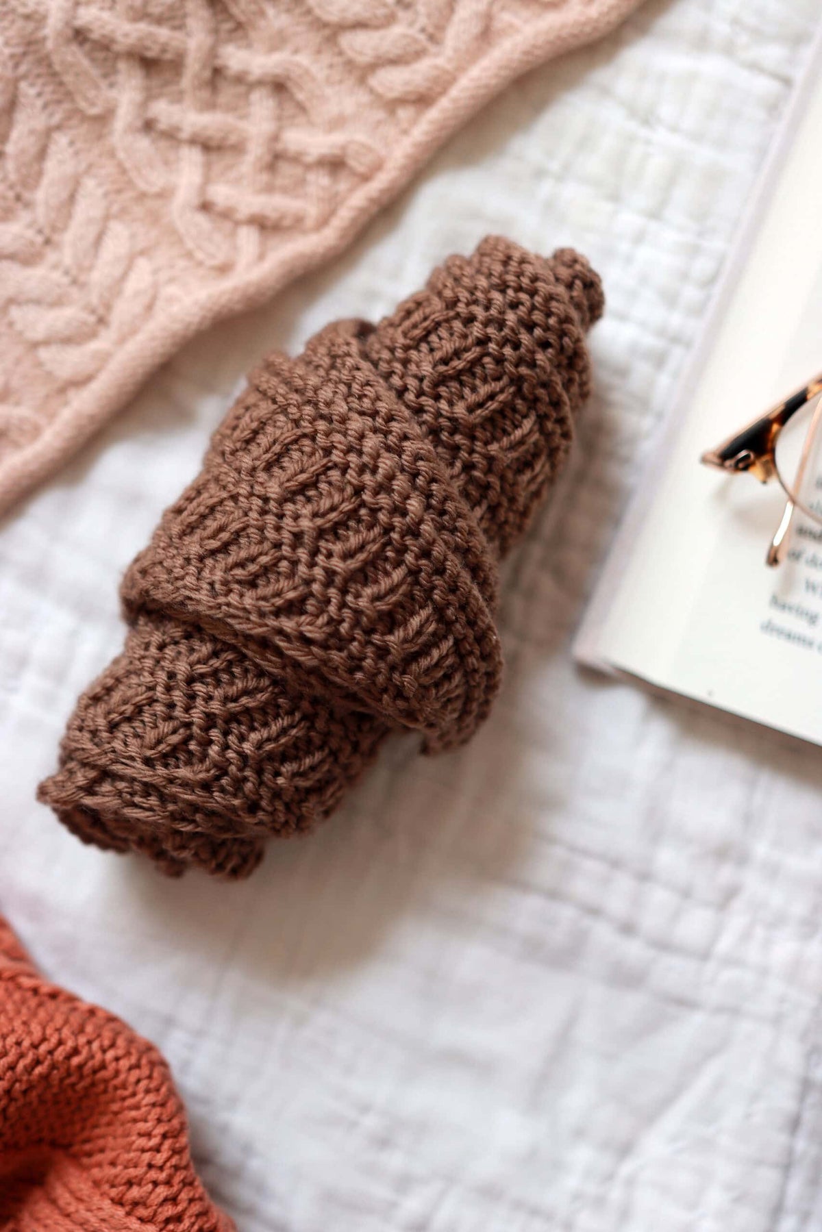 The Ember Scarf small scarf knitting pattern styled for layering