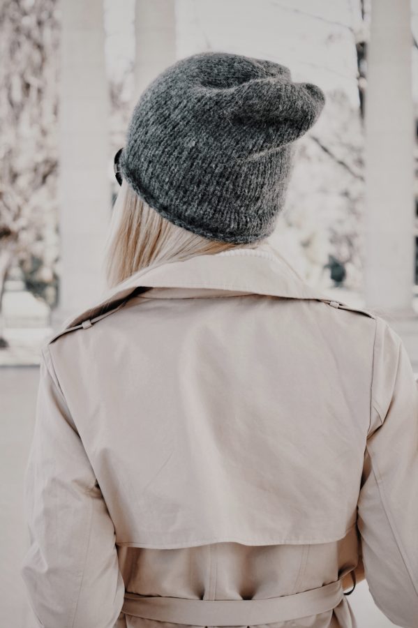 Close up of slouchy beanie knitting pattern showing minimal ribbed texture and relaxed fit