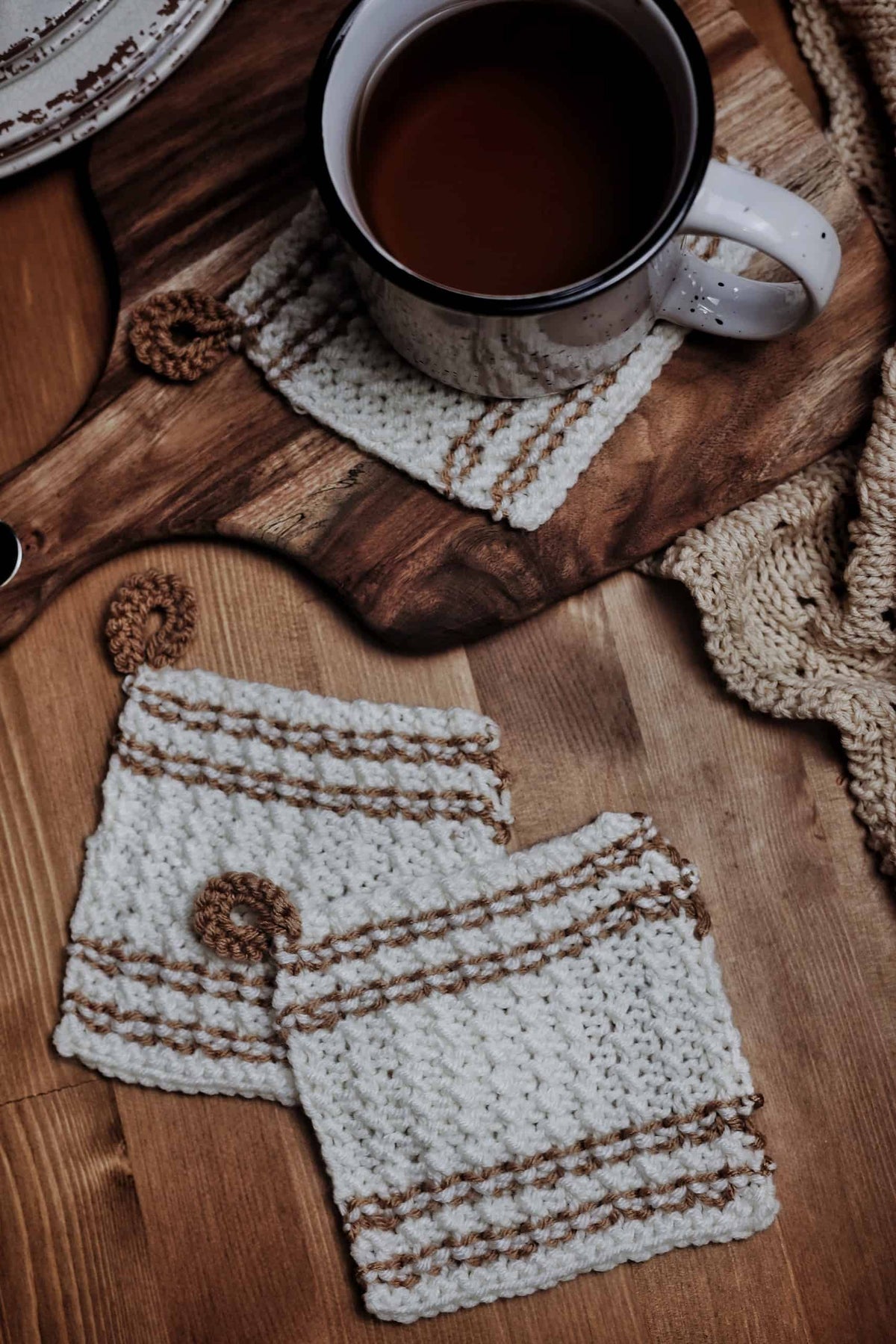 Close-up of knitted farmhouse coaster showing vintage stripe detail and texture