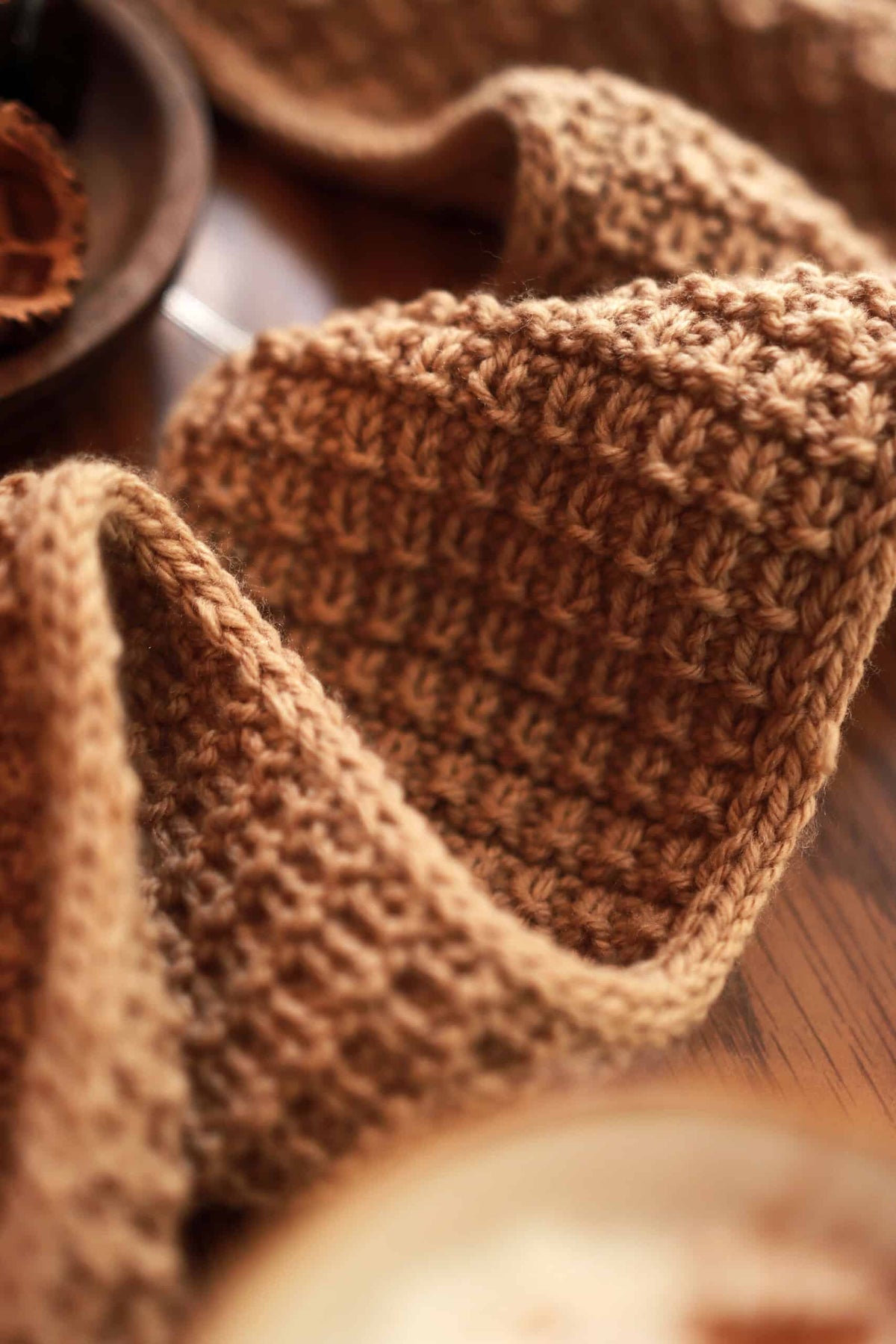 The Villa Scarf knitting pattern styled with minimalist aesthetic and soft drape