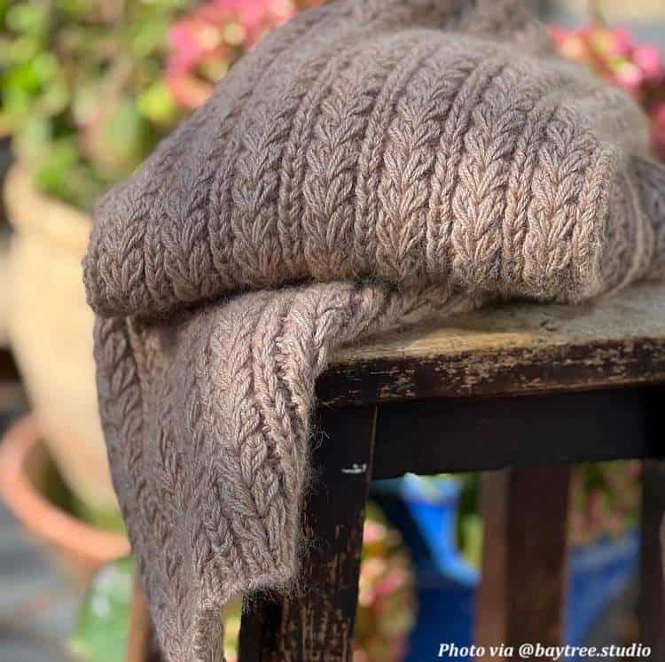 Close up of Windchill scarf knitting pattern texture in lofty worsted weight yarn