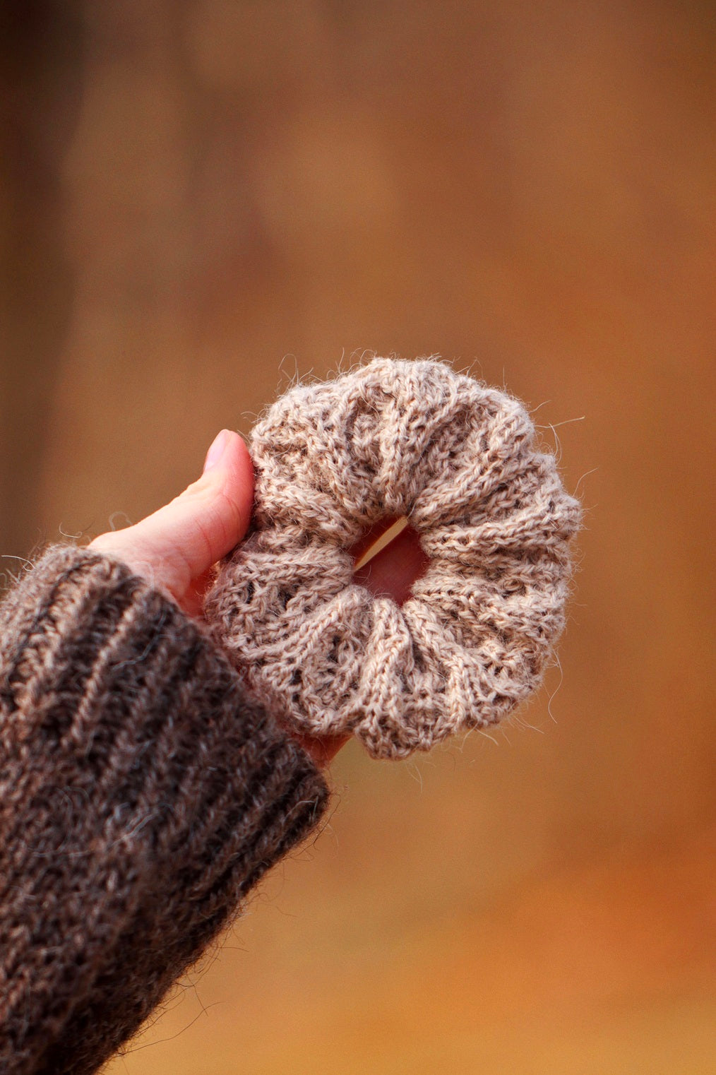 Close-up of Honeysuckle lace scrunchie knitting pattern showing airy stitch detail