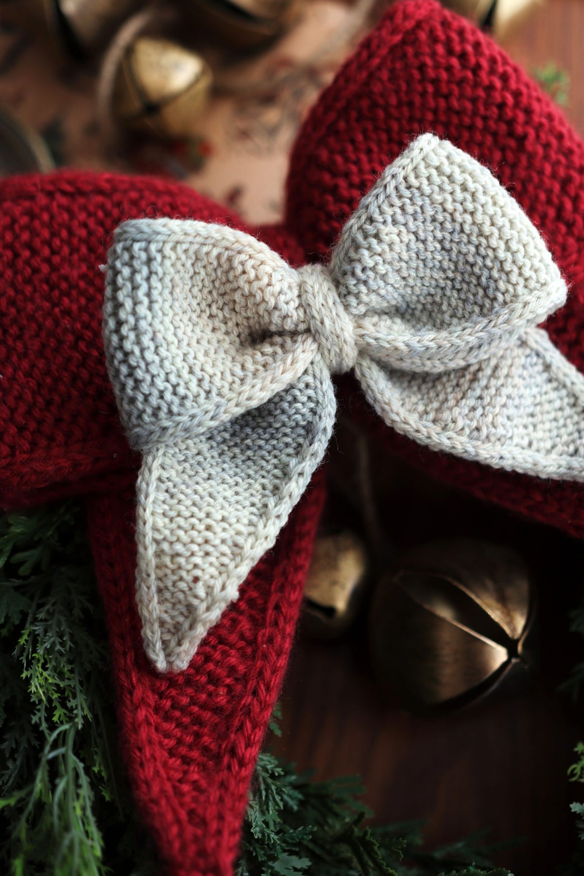 Knitted bow pattern detail showing meditative garter stitch texture