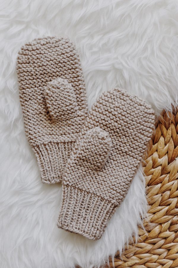 Close-up of cozy hand-knit mittens showing garter stitch texture - Frostfall Mitts pattern