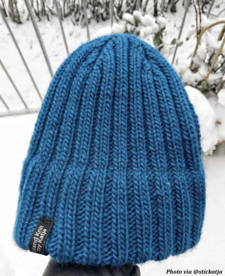 Mens beanie knitting pattern in worsted weight yarn with classic ribbed design