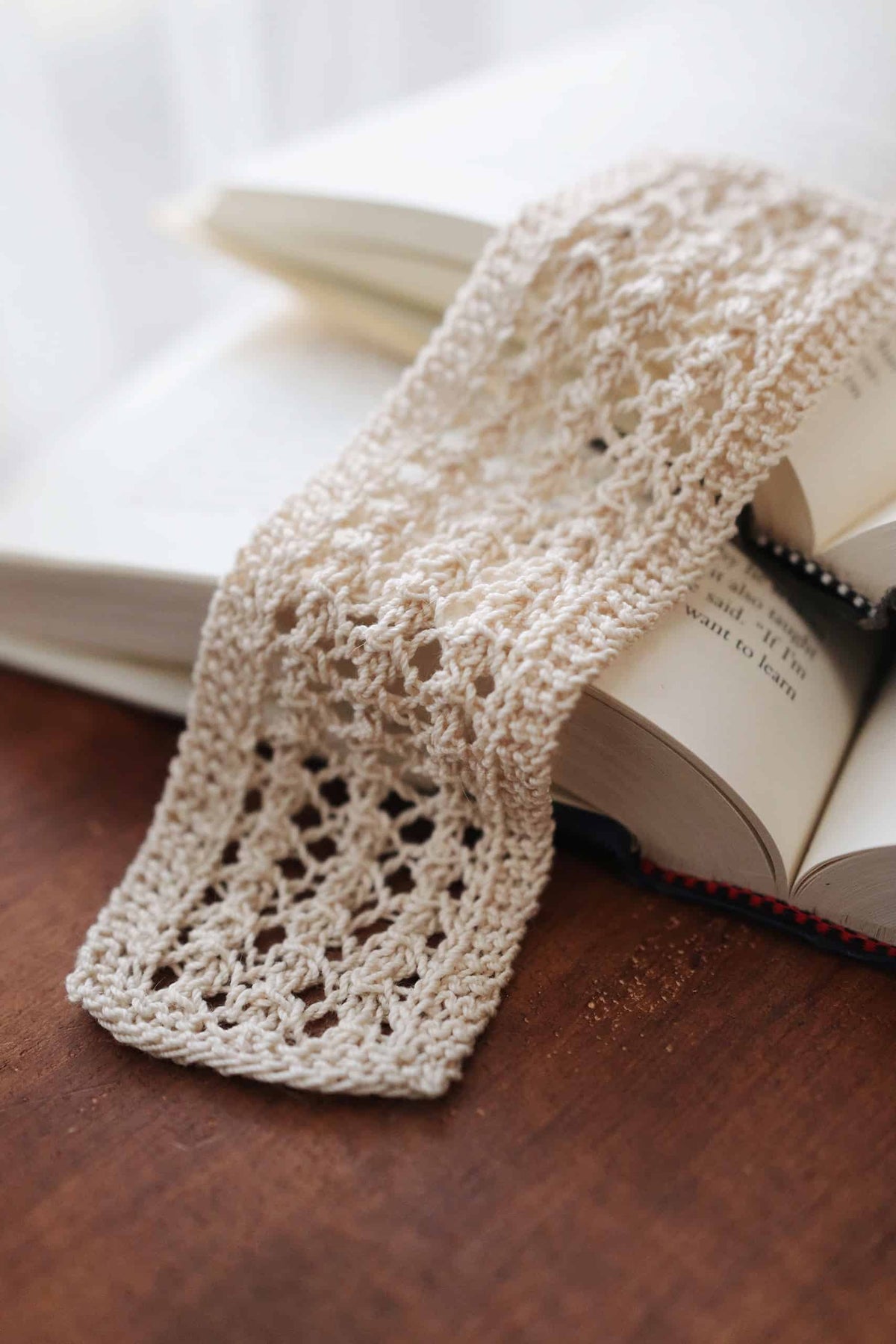 Handmade lace knit bookmark with romantic vintage design detail