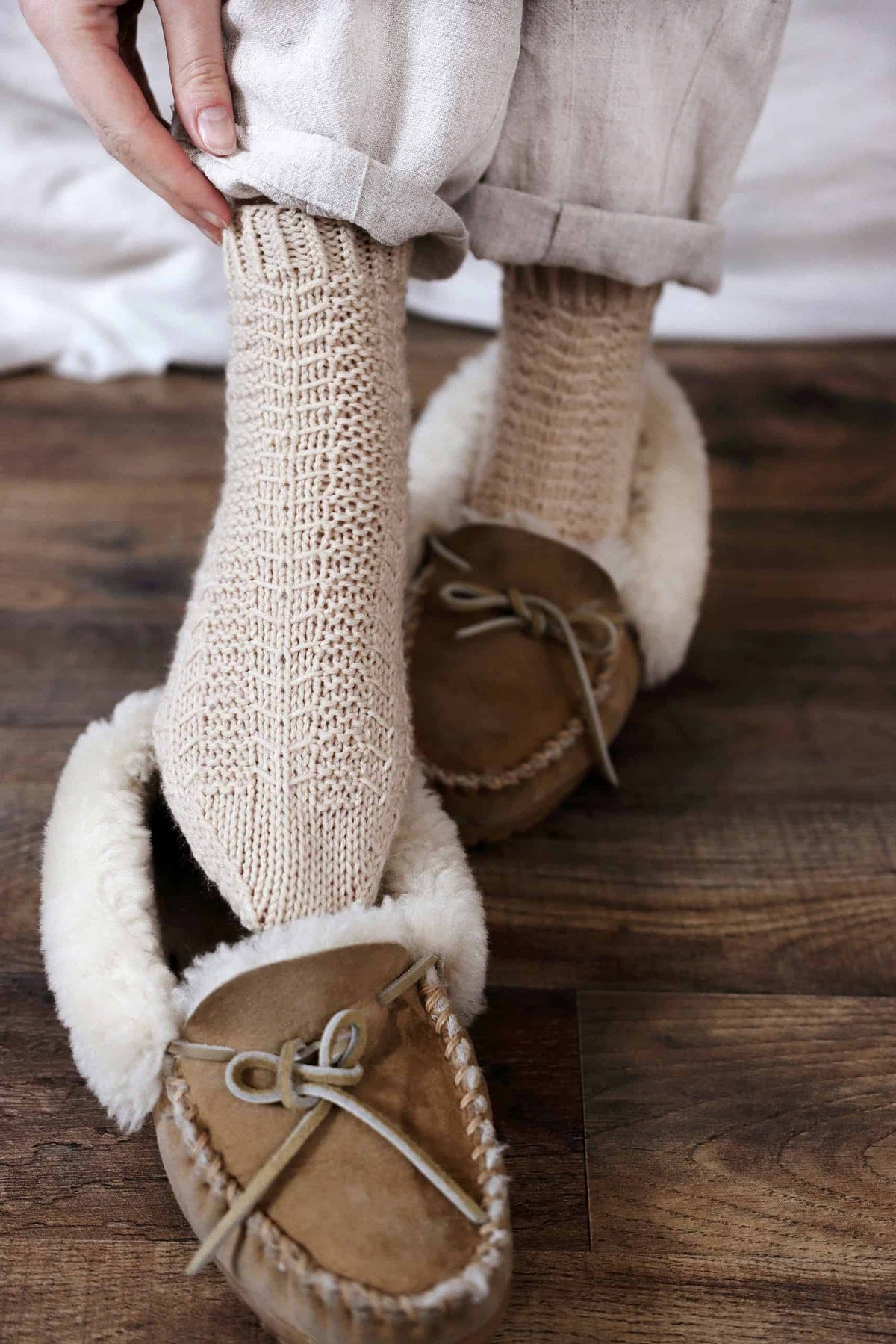 Hand knit Pinewood socks pattern worn showing elegant geometric texture design