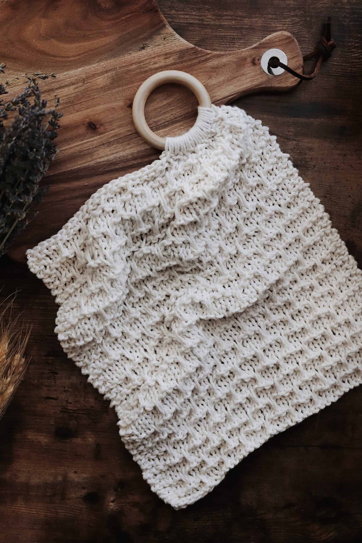 Beginner-friendly hand towel knitting pattern with wooden ring hanger detail