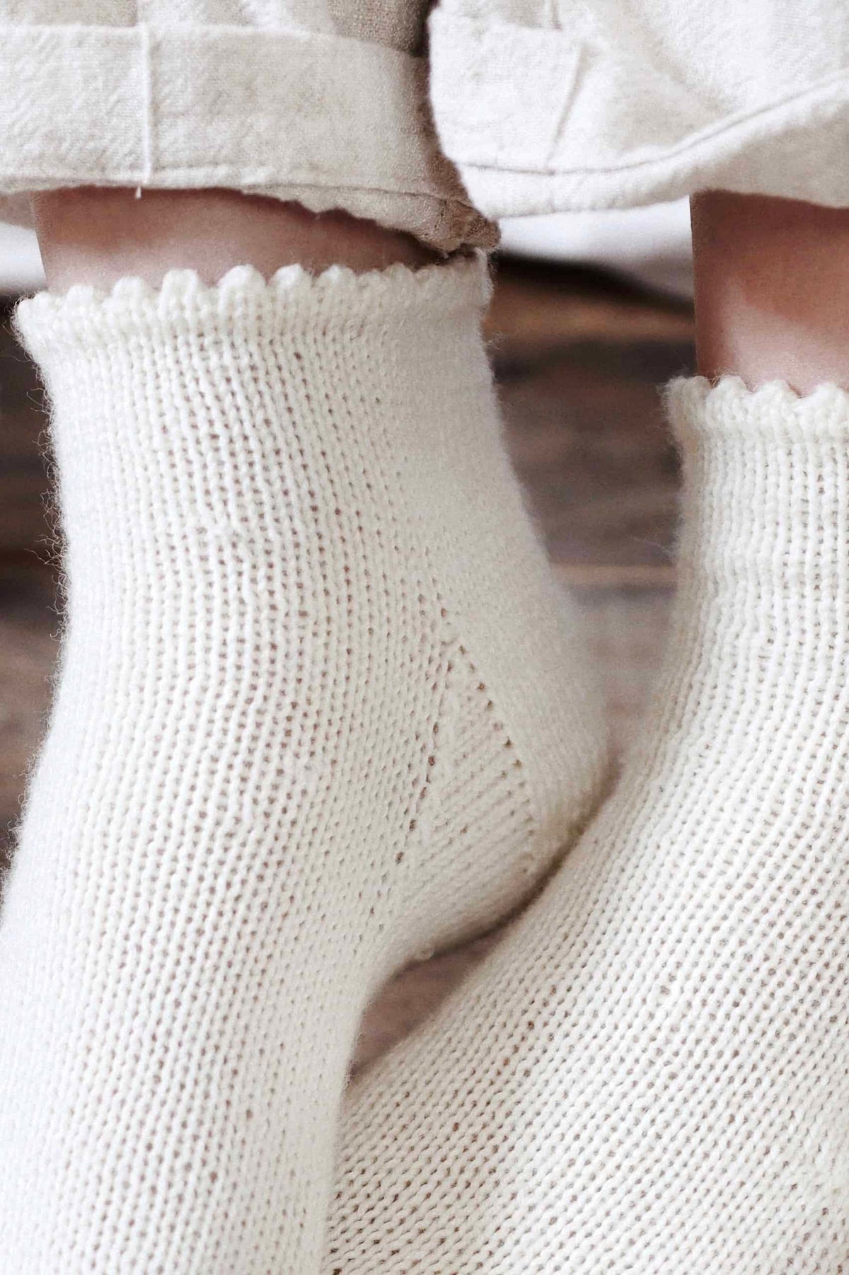 White knit socks pattern with timeless picot edge design