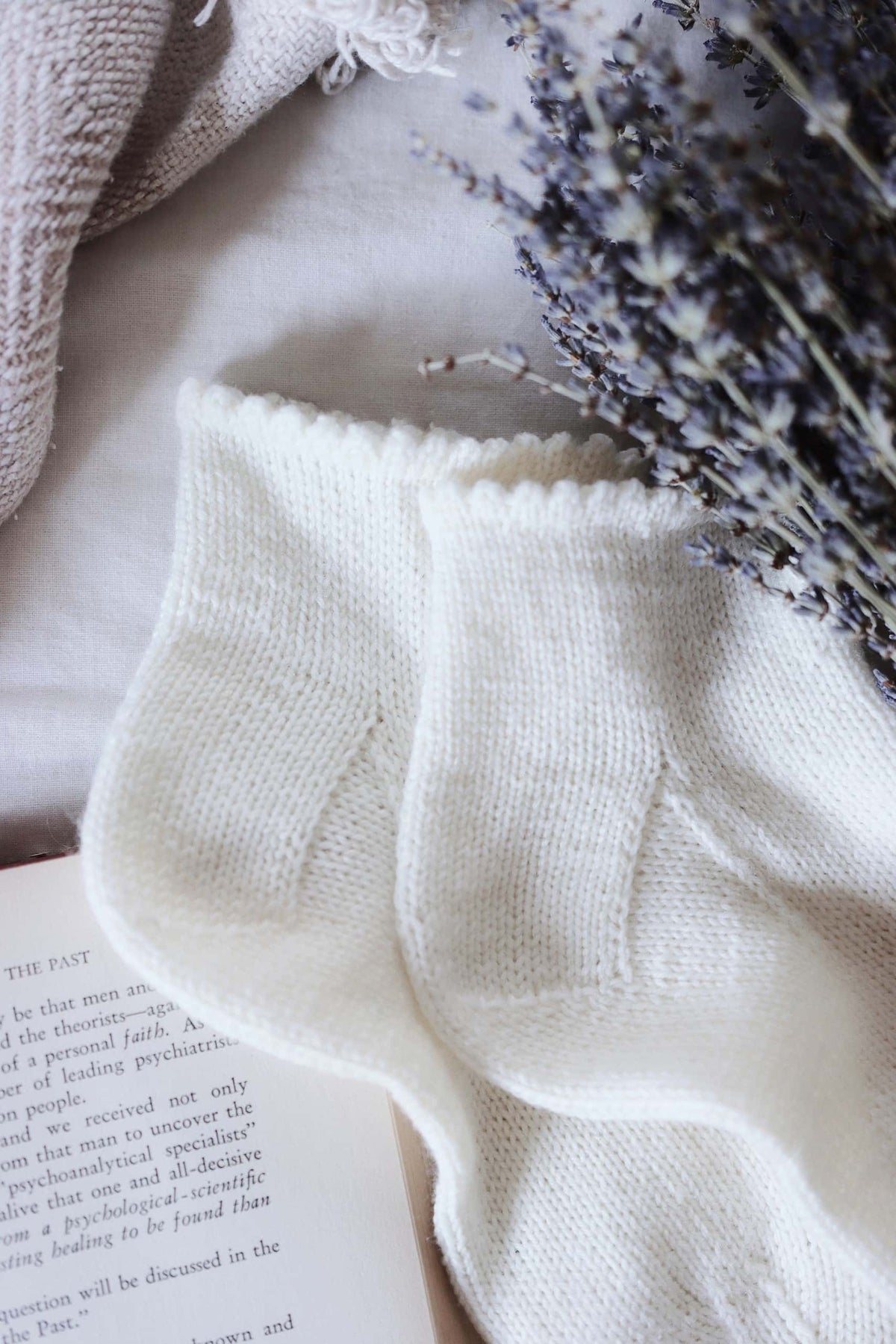 Easy socks knitting pattern featuring delicate ruffle cuff