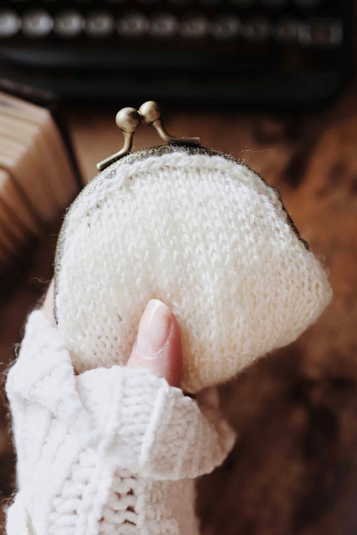 Vintage knit coin purse pattern showing romantic design perfect for gifting