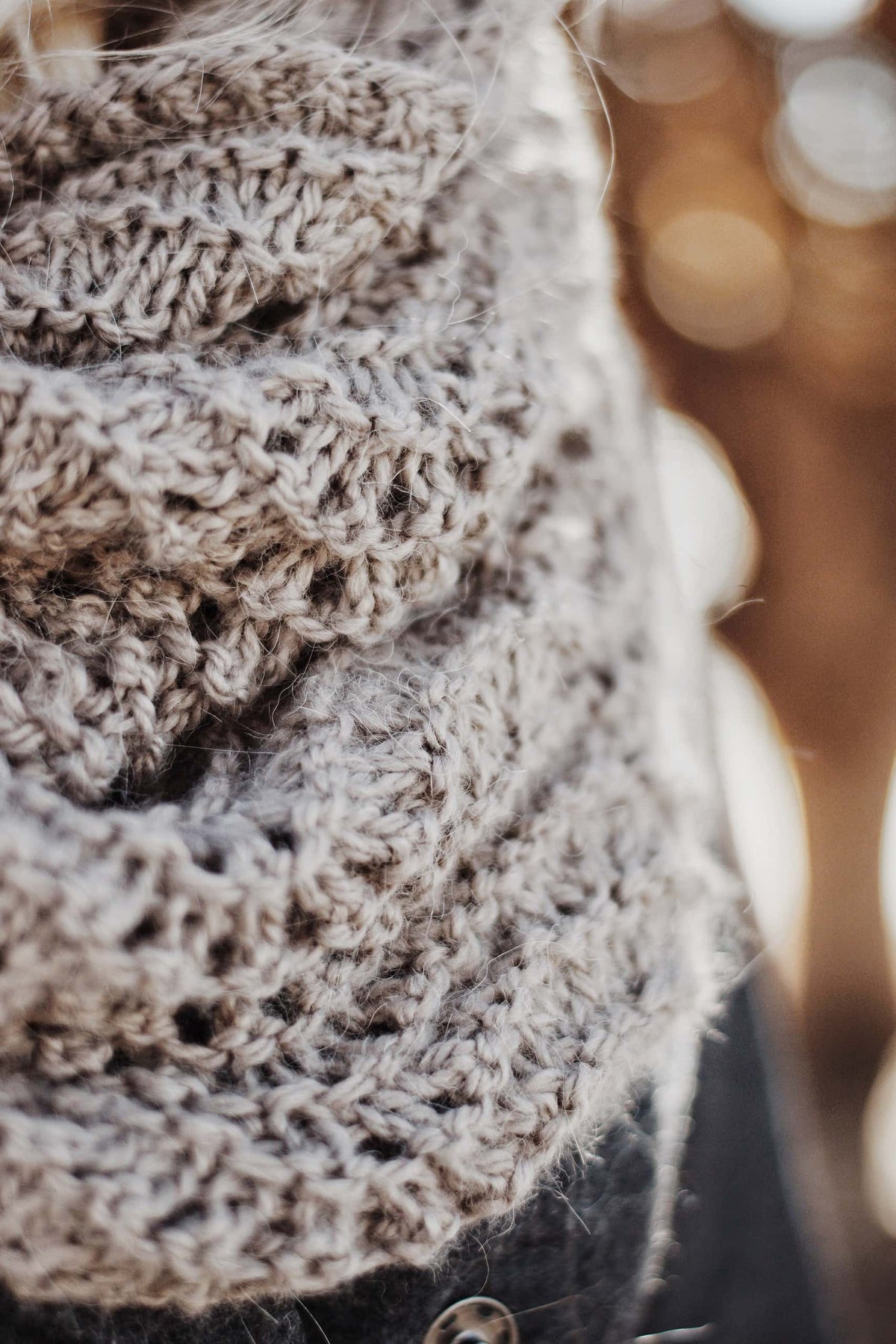 Woman wearing cream Fauna lace cowl scarf with elegant drape and scalloped edging