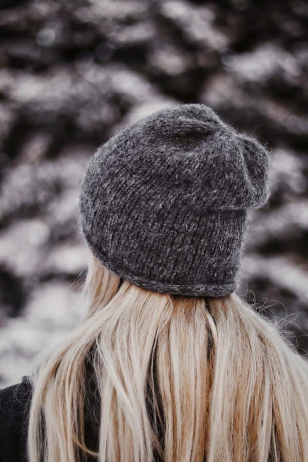 Woman wearing cream slouchy beanie knit pattern, The Hadley Beanie by Darling Jadore