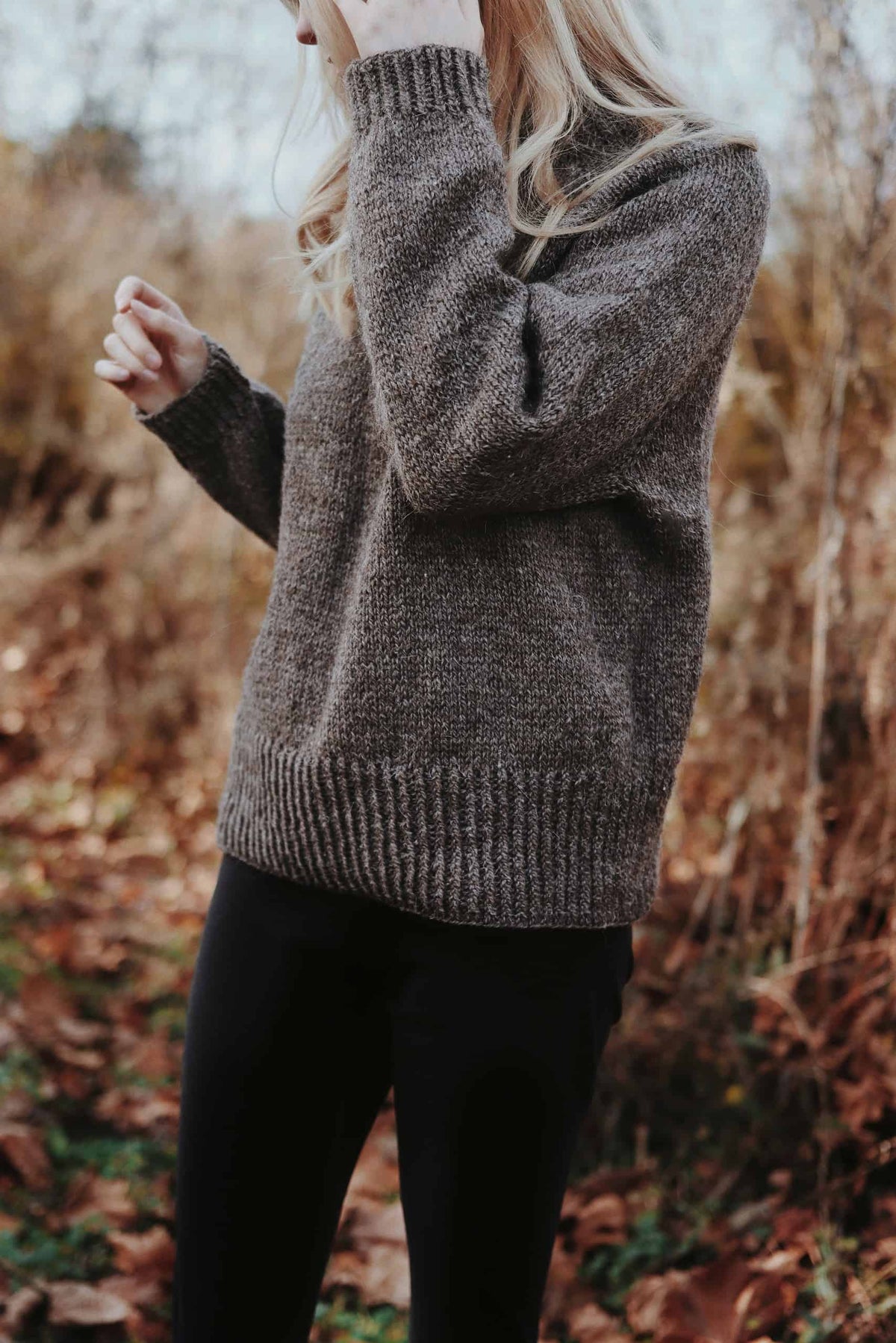 Cozy raglan pullover knit in chunky yarn showing timeless silhouette