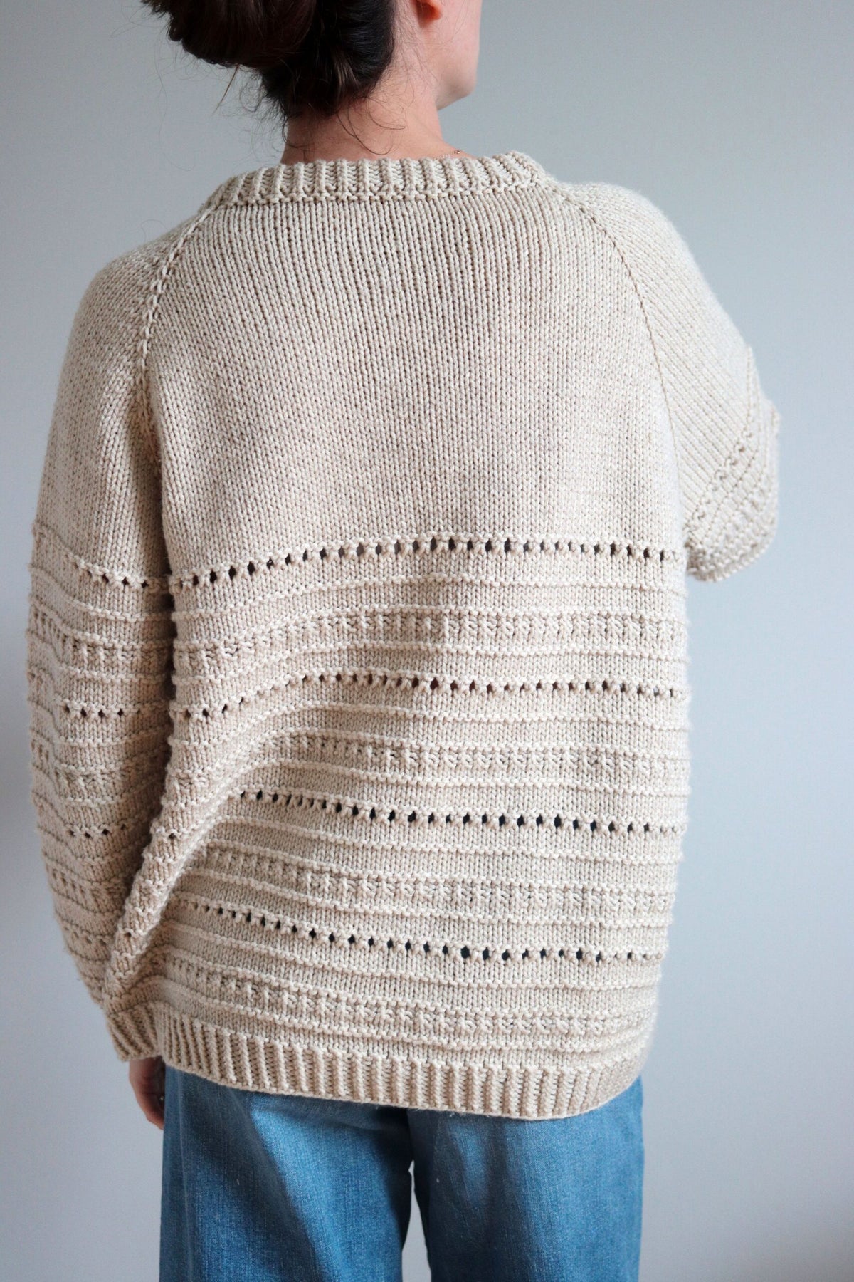Cream eyelet band knit sweater, back view - The Countryside Sweater Knitting Pattern by Darling Jadore