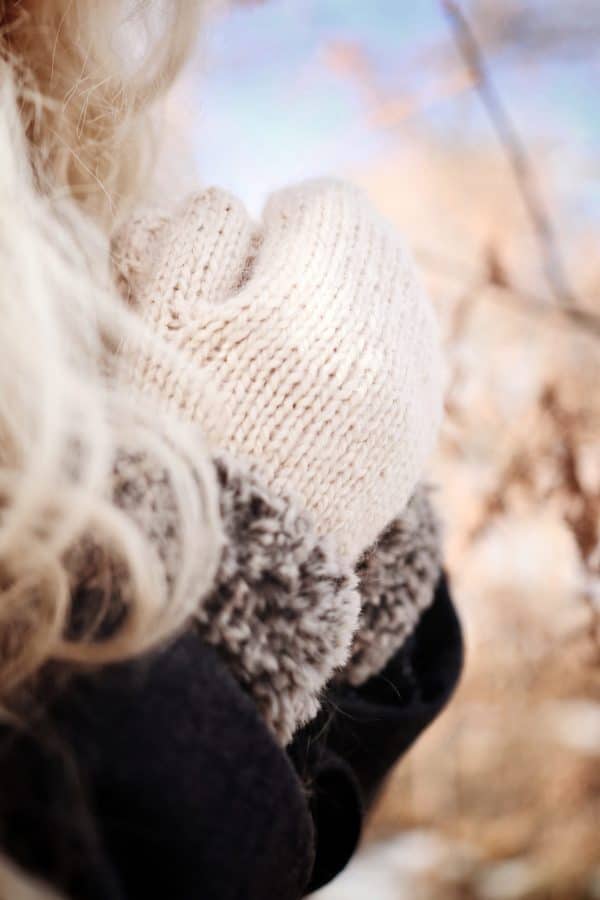 Seamless knit mittens pattern featuring cozy faux fur cuff in neutral tones