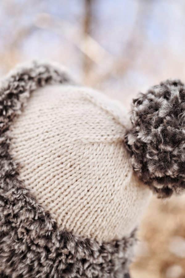 Close up detail of plush faux fur brim on trapper hat knitting pattern - The Tundra Hat
