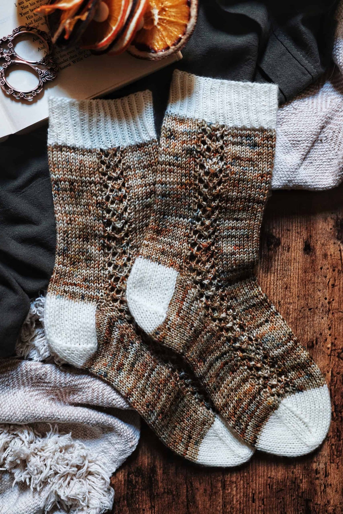Green hand knit socks with elegant lace panel detail - The Garden Socks knitting pattern by Darling Jadore