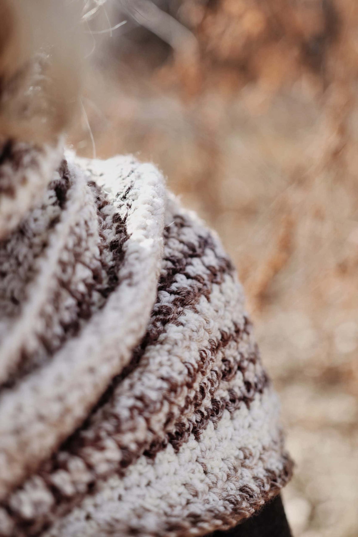 Timeless houndstooth crochet scarf pattern with classic broken check texture